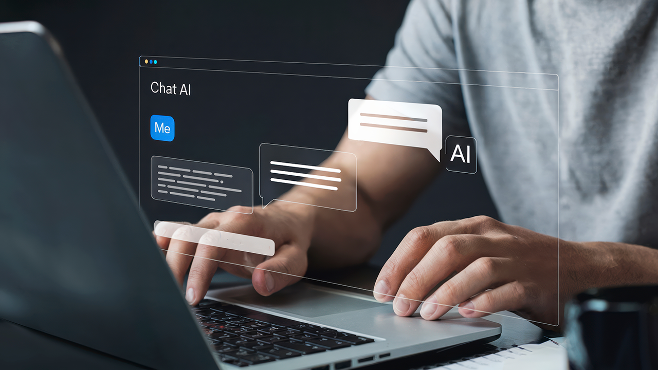 Professional using a laptop with an AI chatbot interface on screen, showcasing applied machine learning skills in action.